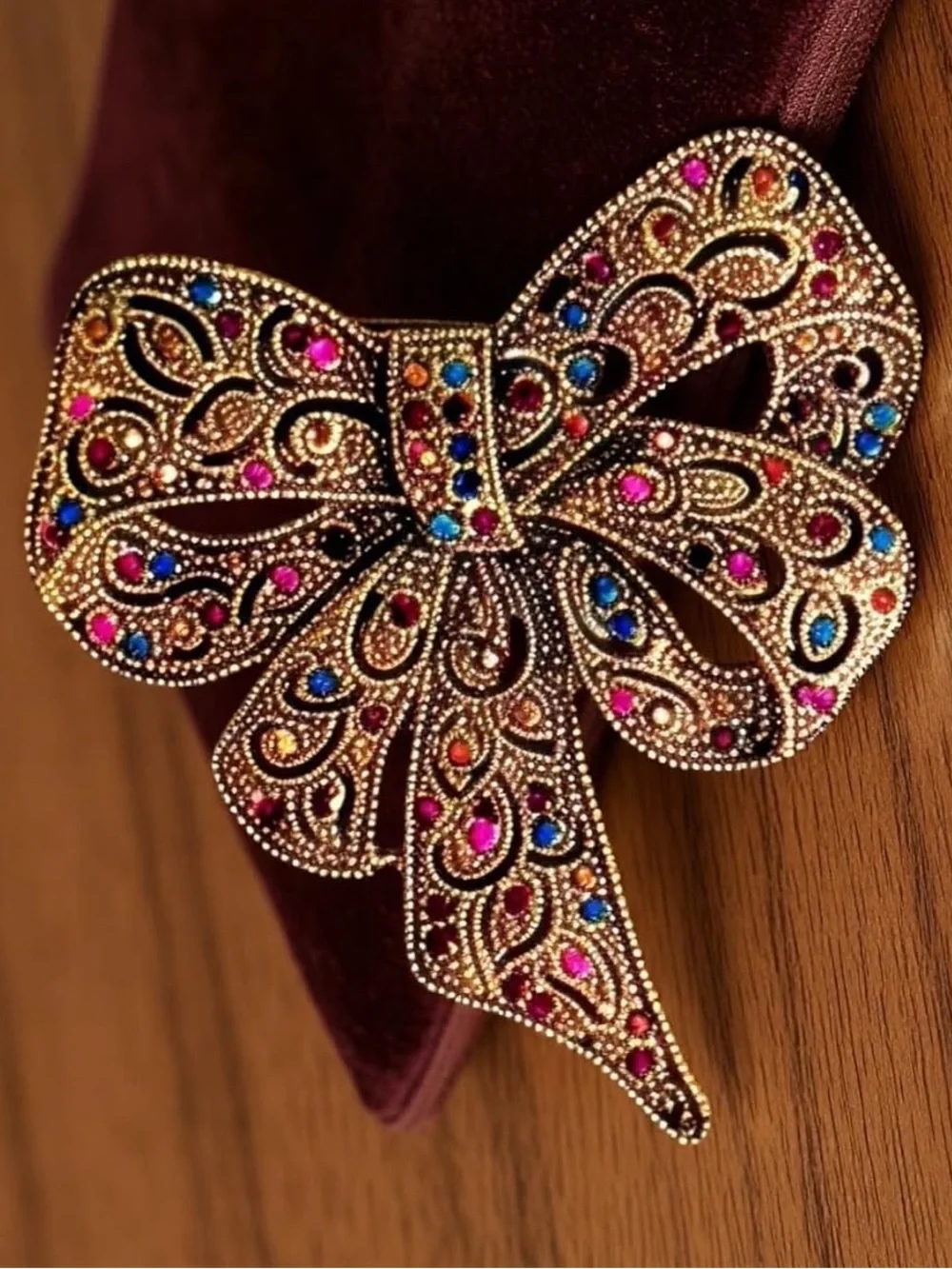 Anthropologie Gold Tone Bow Brooch with Pink, Blue, Orange Gems